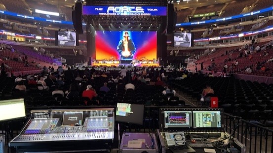 Arena before the show with the F.O.R.C.E. Tour video screen, a console and measurement screens in the foreground
